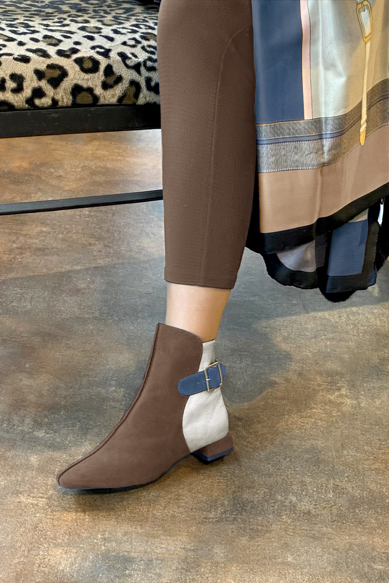 Chocolate brown, light silver and denim blue women's ankle boots with buckles at the back. Square toe. Flat flare heels. Worn view - Florence KOOIJMAN